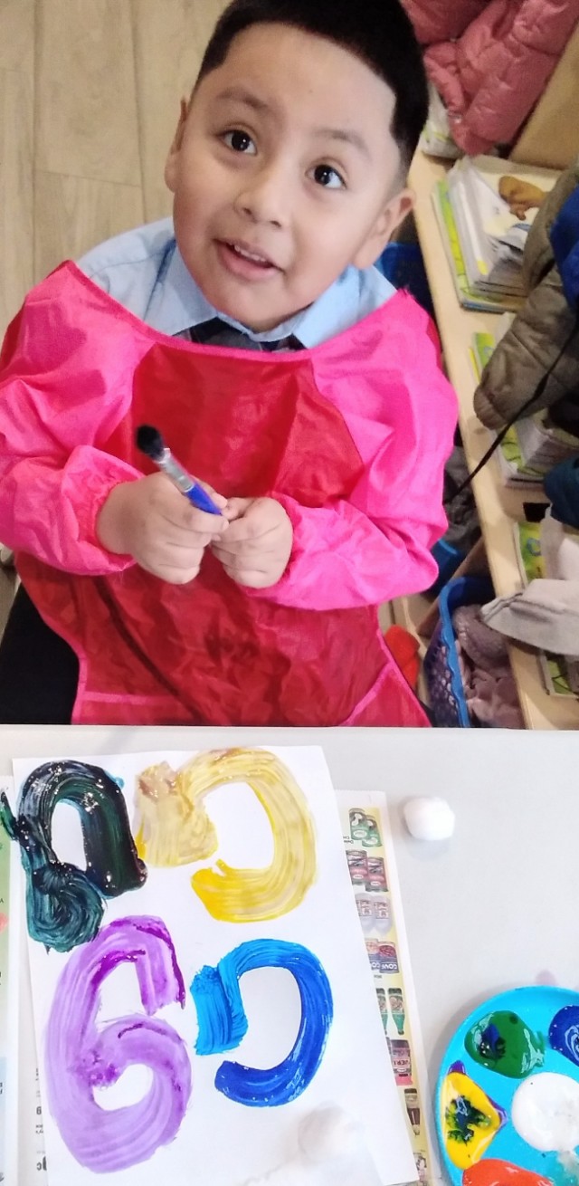 Children's colorful classroom activity at Loving Childcare